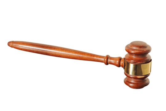 Wooden judge gavel taken closeup. Isolated.