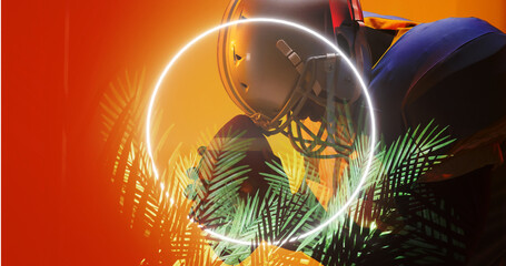 Stressed american football player wearing helmet and holding ball by illuminated circle and plants