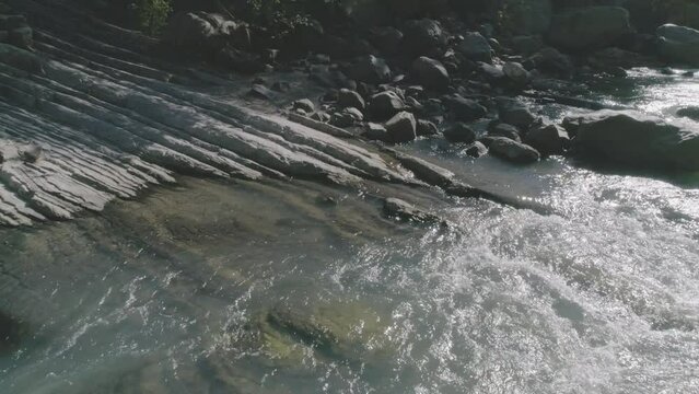 water flowing into the river