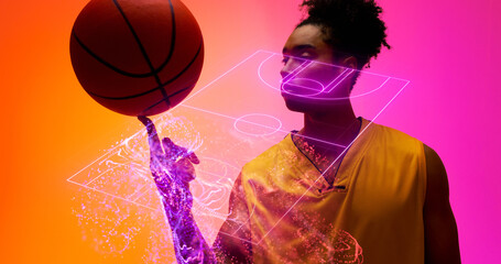 Naklejka premium Composite of biracial male player spinning ball on finger over illuminated basketball court