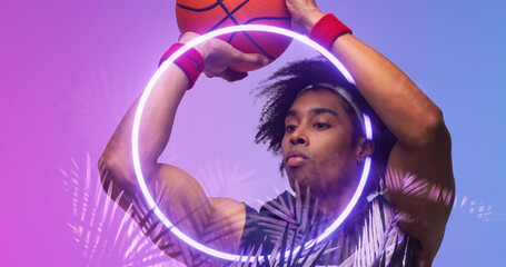 Naklejka premium Composite of biracial male player throwing basketball by illuminated plants and circle, copy space