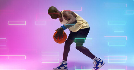 Side view of bald african american basketball player dribbling ball over illuminated rectangles
