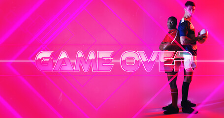 Composite of multiracial male players standing by illuminated game over text on pink background