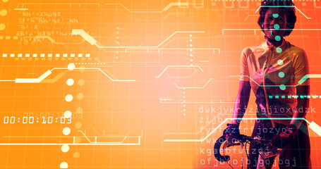 Biracial female athlete riding bike over illuminated grid pattern with lines, dots and codes