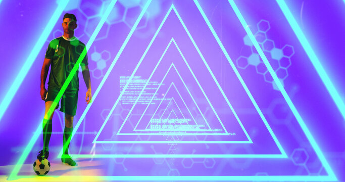 Caucasian young athlete with ball seen through geometric neon over molecular structure background