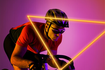 Triangle neon over determined biracial young male cyclist riding bicycle against pink background - Powered by Adobe