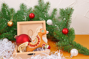 Handmade Christmas toy horse in a box