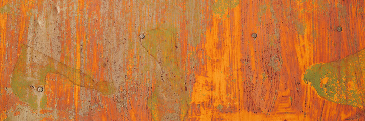 Old rusty metal texture. Rust on the surface of the iron wall. Panoramic background for grunge design.
