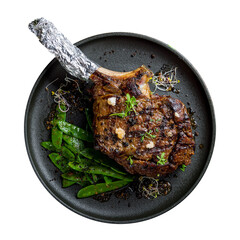 the Tomahawk steak on a black plate with green beens top view isolated on white background
