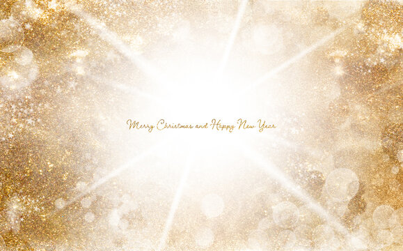Golden Christmas background with sparkling and twinkling bokeh. Greeting card with shiny shimmering sparkles and central copy space for your seasonal greeting