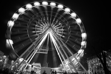 Carousel "Ferris wheel" at the Christmas market in the evening