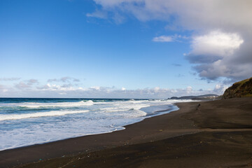 Atlantic ocean, waves and sand, good weather, Azores islands.