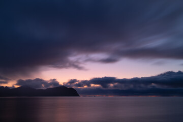 Twilight glow over distant mountains, Lofoten Islands, Norway