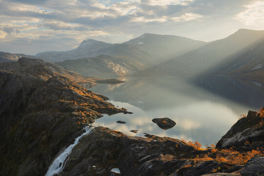 Waterfall flowing from Litlvervatnet lake, Rago national park, Norway