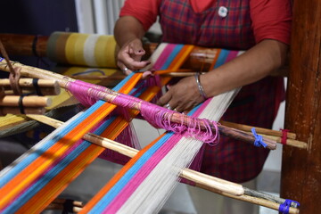 Fototapeta na wymiar loom weaver