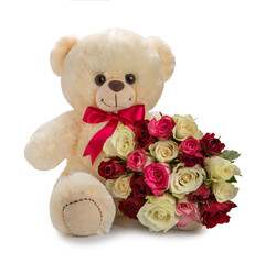 Teddy bear with a bow and a bouquet roses isolated.