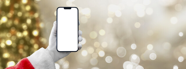 santa claus holding a mobile phone on christmas background with transparent screen png