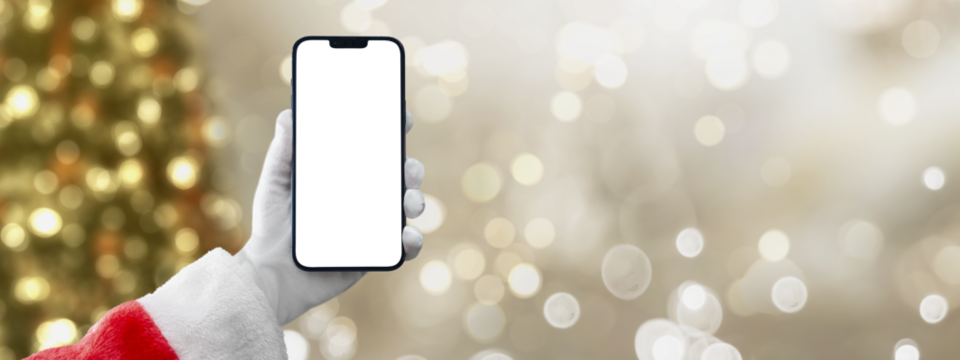 santa claus holding a mobile phone on christmas background with transparent screen png