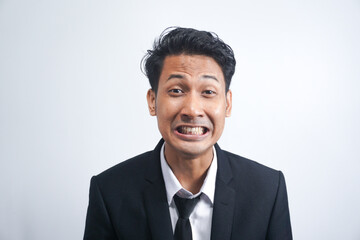 Portrait of an angry man wearing suit