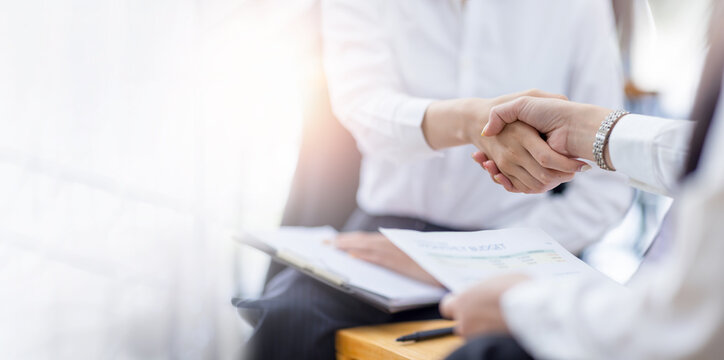 Business handshake and business people. Business concept.