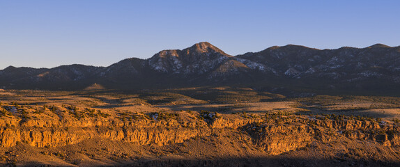 Sunset panorama of the Sangre de Cristo Mountains and Rio Grande Gorge near Taos, New Mexico - obrazy, fototapety, plakaty