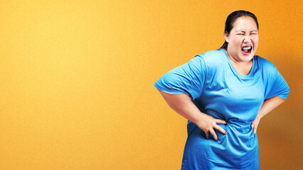 Asian fat overweight woman feeling stomach ache