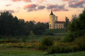 Obraz premium View of the Castle of the Russian Emperor Paul I-Marienthal (BIP fortress) from the Slavyanka River on a sunny summer morning, Pavlovsk, Saint Petersburg, Russia