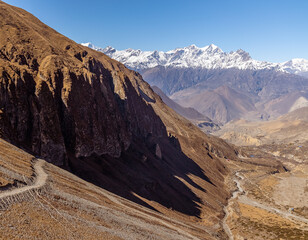 Dramatic shadows from mountain range on the Annapurna Circuit Trek in Nepal