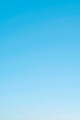Blue Sky without cloud and clear abstract, Beautiful air sunlight with clear the sky scape colorful, used wallpaper background, vertical image