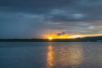 Rainy day sunrise at the waterfront