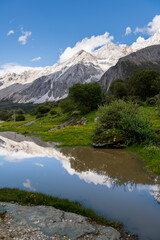 Fototapeta na wymiar Nature landscape image during summer time, Snow Mountain in daocheng yading, Sichuan, China.