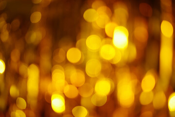 Blurred golden bokeh background.