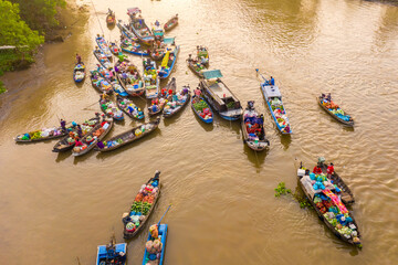 Aerial view from above Phong Dien floating market on Tet holiday full of fruit and agricultural...