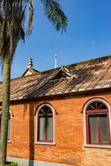 Sunny exterior view of the campus of Aletheia University