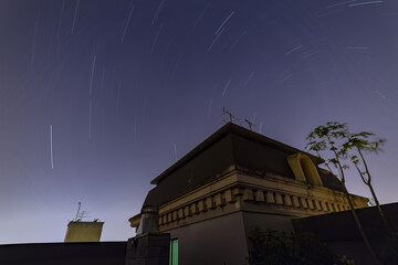Night view of the star sky from a rooftop