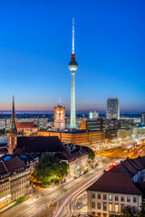 The iconic TV Tower and Berlin Mitte with the town hall at night - 552513731