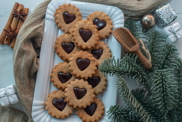 Obraz na płótnie Canvas chocolate linzer cookies, typical german christmas cookies