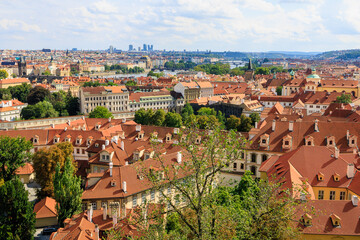 Obraz premium Roofs of houses and a view of the city of Prague. Background with selective focus and copy space