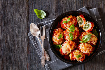 tasty chicken rollatini in tomato sauce, top view