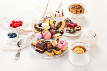 Afternoon tea stand with sweet treats.