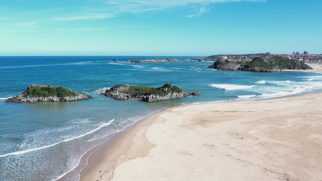 Landscape of sand and rocks on the beach.  Noja, Cantabria, Spain, Europe