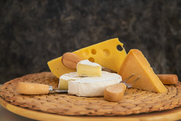 Cheese is on the table. Selective focus.