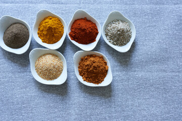 Spices close-up on a gray background.