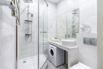 Bright empty modern bathroom with a sink in an apartment