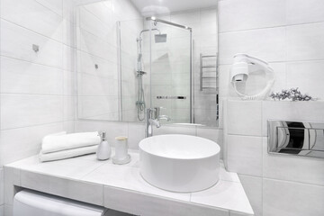 Bright empty modern bathroom with a sink in an apartment