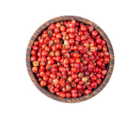 pink peppercorn in wood bowl isolated on transparent png
