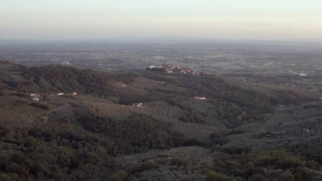 Tuscany hills sunset. Old castle. Aerial flightscenic landscape