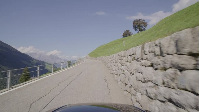Driving video of the Sustenpass in Switzerland. The Susten pass is a famous alp road and has a scenic mountain panorama. View from the car. Experience calming nature and exciting pass roads.