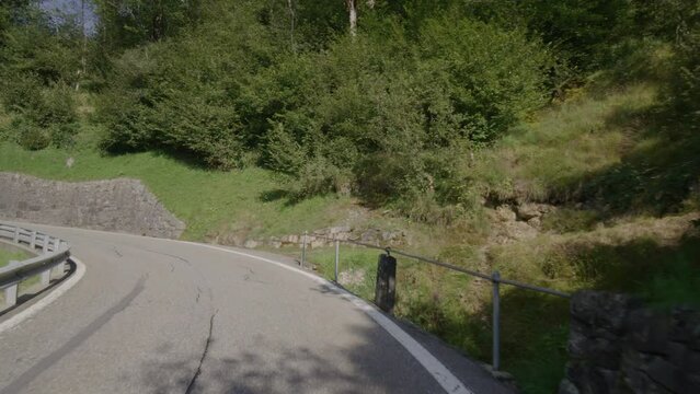 Driving video of the Sustenpass in Switzerland. The Susten pass is a famous alp road and has a scenic mountain panorama. View from the car. Experience calming nature and exciting pass roads.