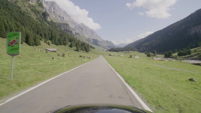 Driving video of the Sustenpass in Switzerland. The Susten pass is a famous alp road and has a scenic mountain panorama. View from the car. Experience calming nature and exciting pass roads.